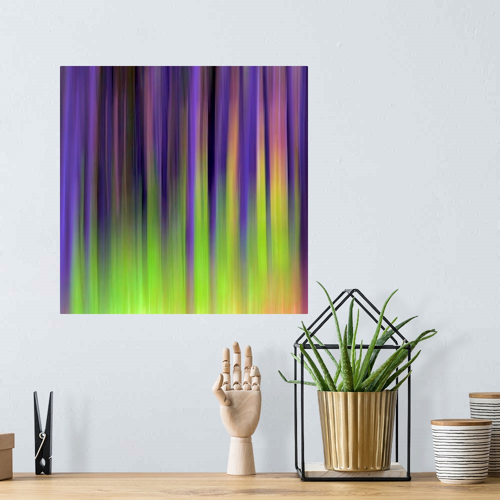 A bohemian room featuring Abstract photograph of vertical blurred stripes of color.