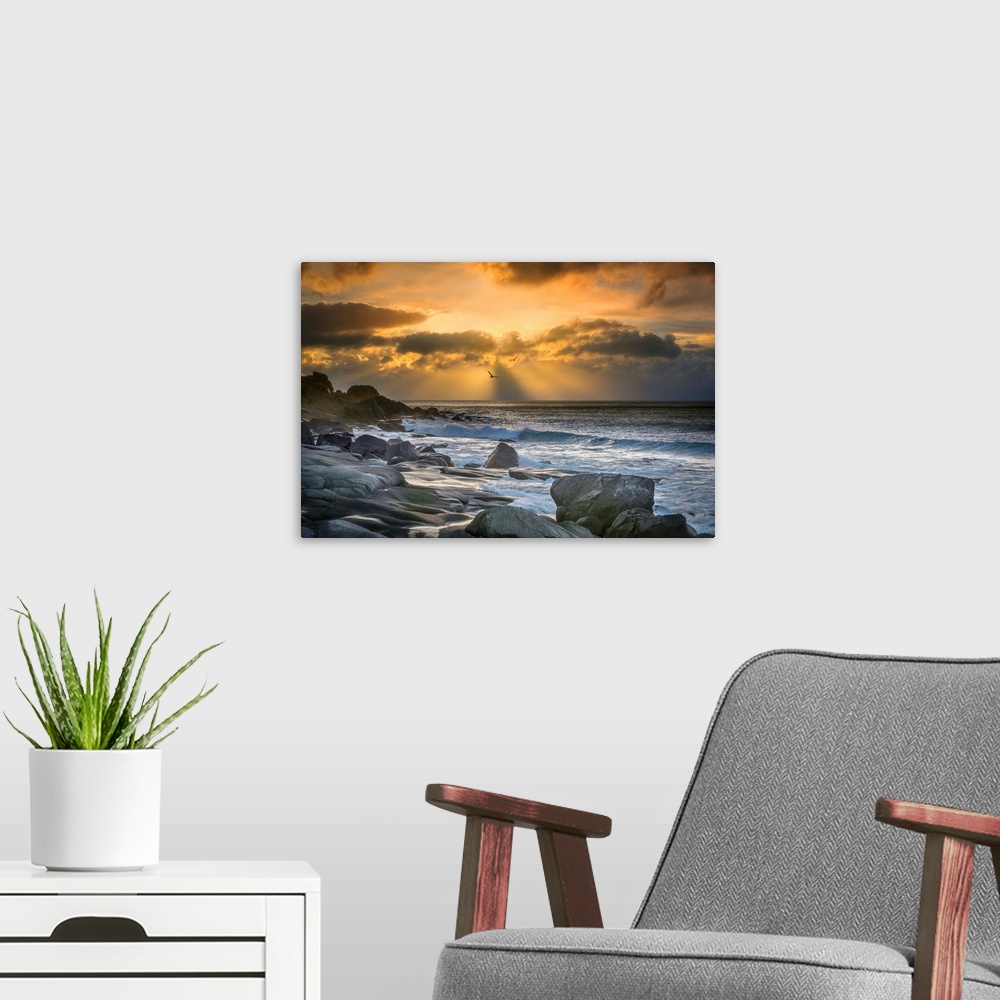 A modern room featuring Rocky coast of Lofoten, Norway, at sunset.