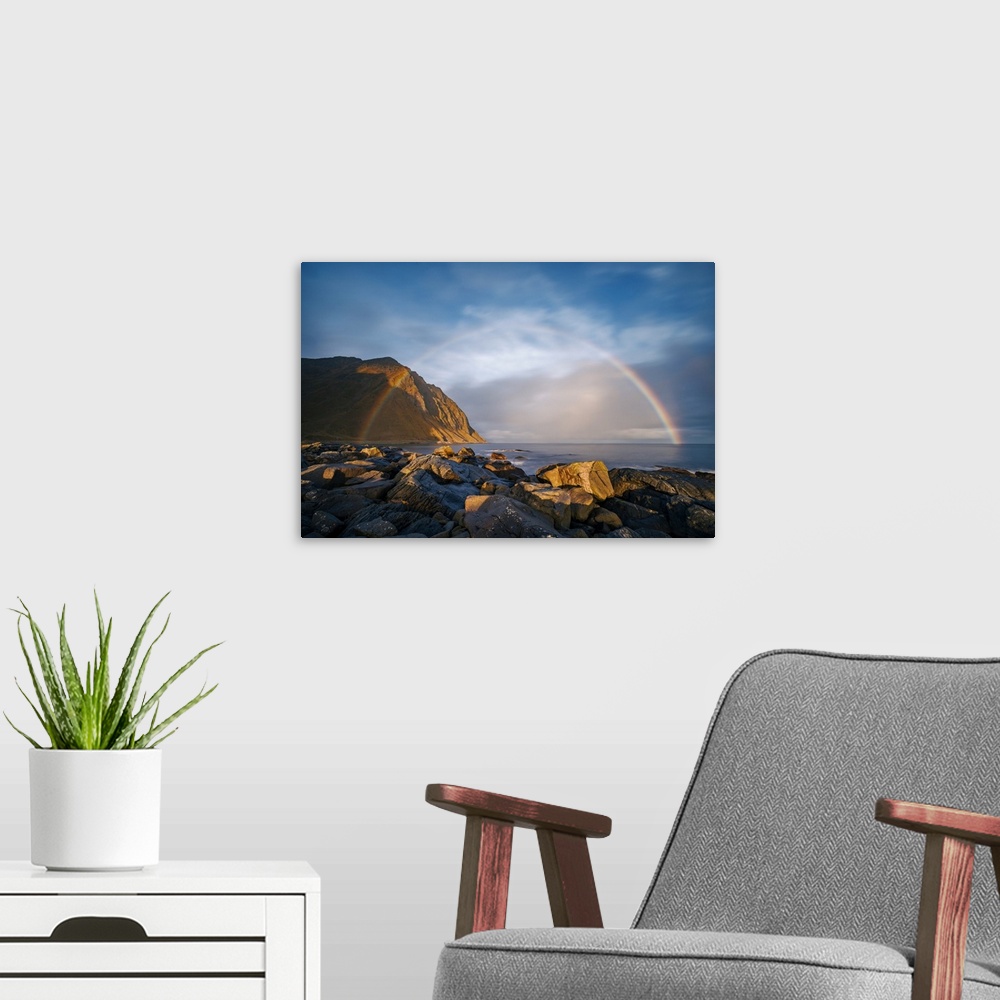 A modern room featuring Sunrise at Napp, Lofoten, Norway. Just as I climbed onto the slippery rocks in the morning drizzl...