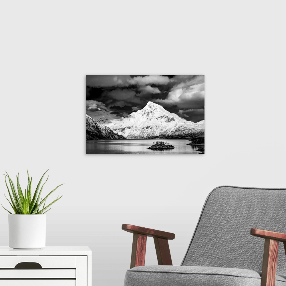A modern room featuring A lake surrounded by snowy mountains
