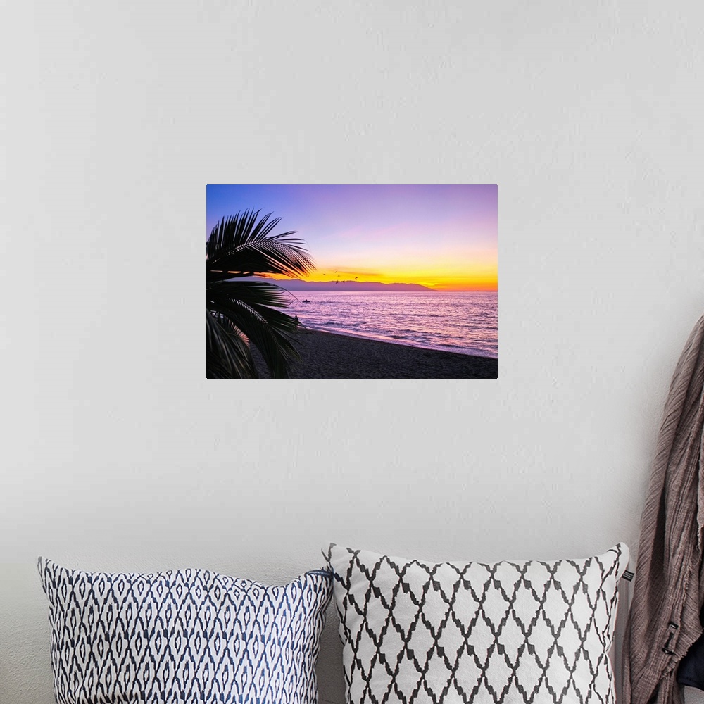 A bohemian room featuring Los Muertos beach Sunset, Puerto Vallarta, Mexico.