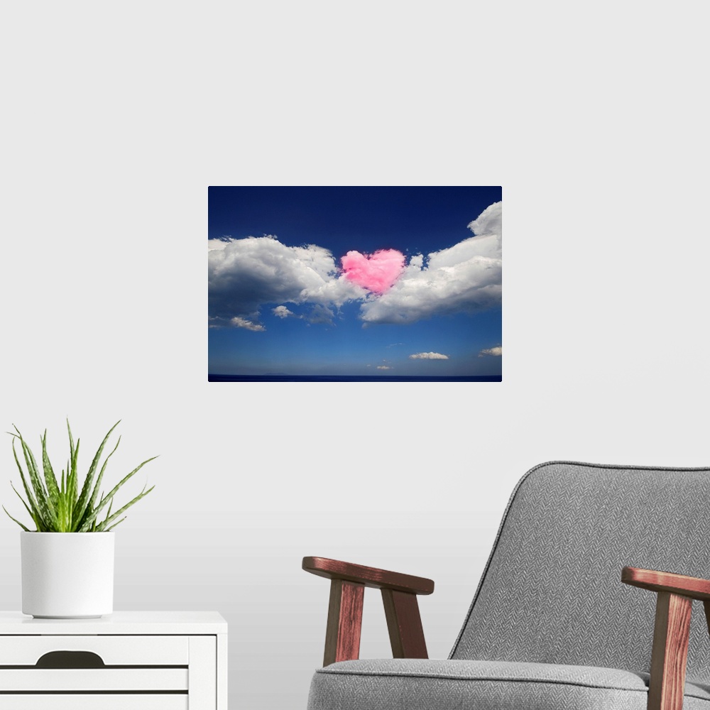 A modern room featuring This large piece shows immense clouds with a heart shaped cloud in the middle that has been color...