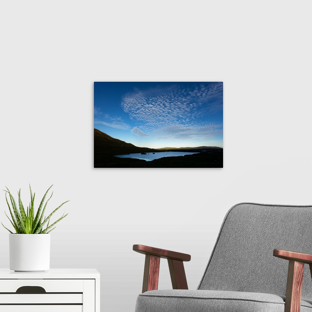 A modern room featuring Cloudy blue sky over a lake in Ireland