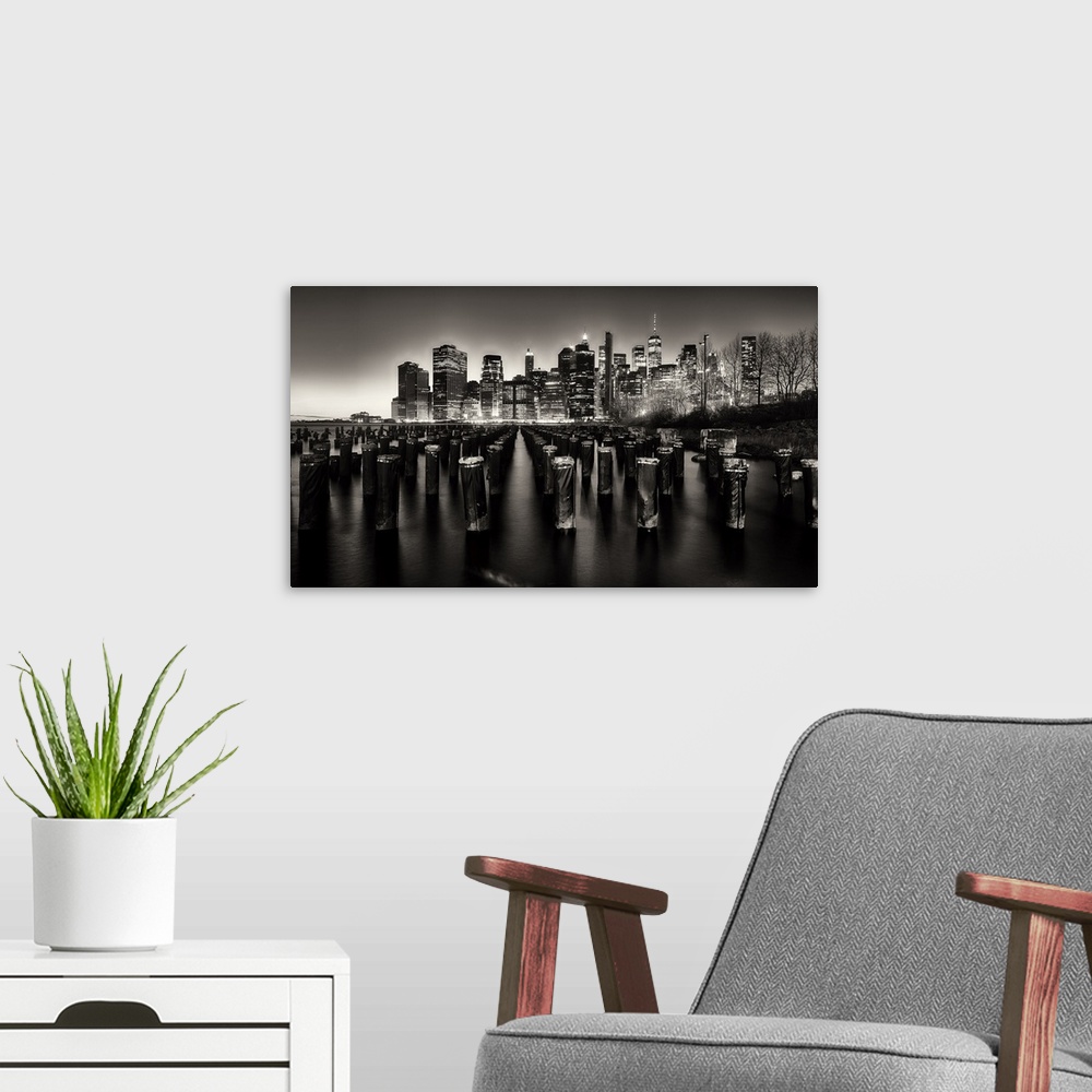 A modern room featuring Lower Manhattan Nightscape Viewed from Brooklyn, New York City.