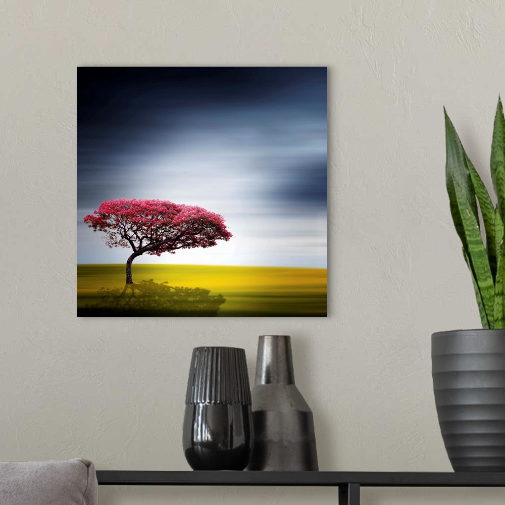 A modern room featuring A red tree in front of a blurred landscape