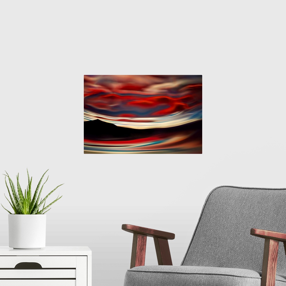 A modern room featuring Abstract image of Slocan lake, giving an impression of some of the beautiful Summer sunsets over ...