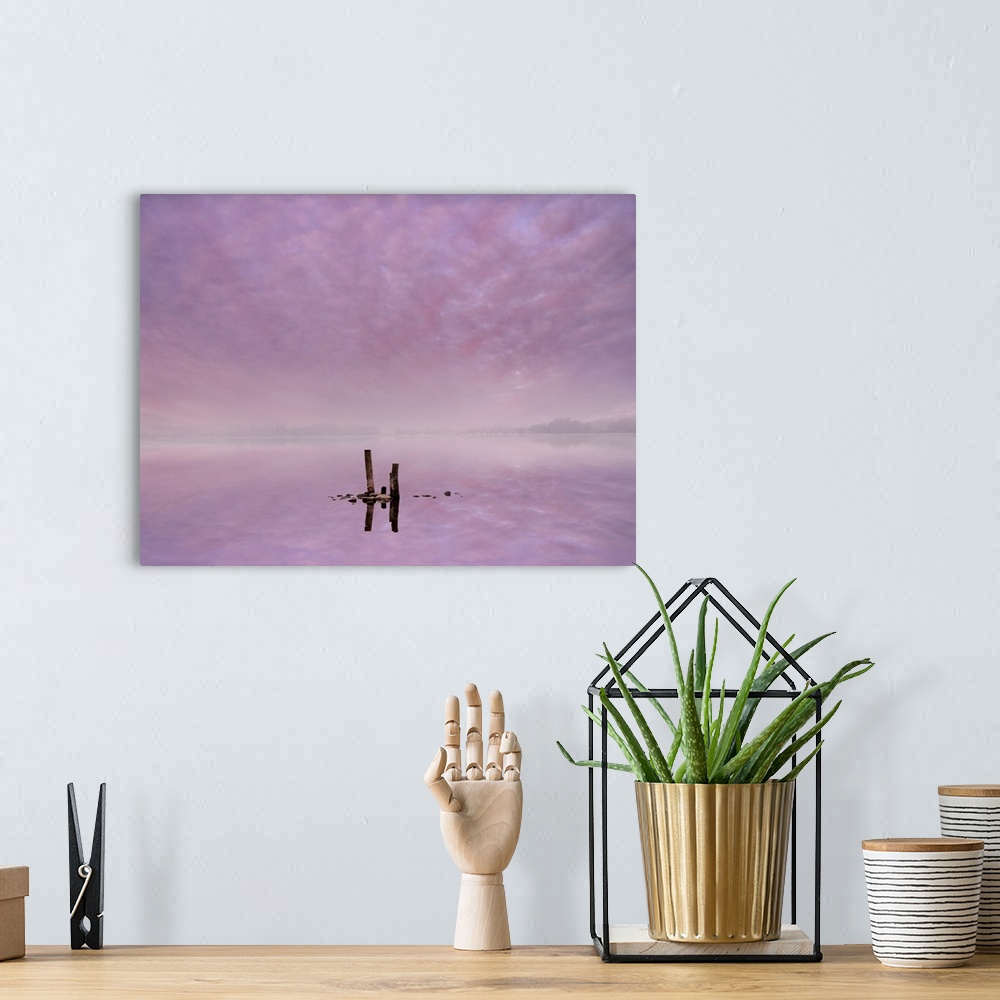 A bohemian room featuring Fine art photo of silhouetted posts in the lavender water of Lake Ullswater, Cumbria in the morning.