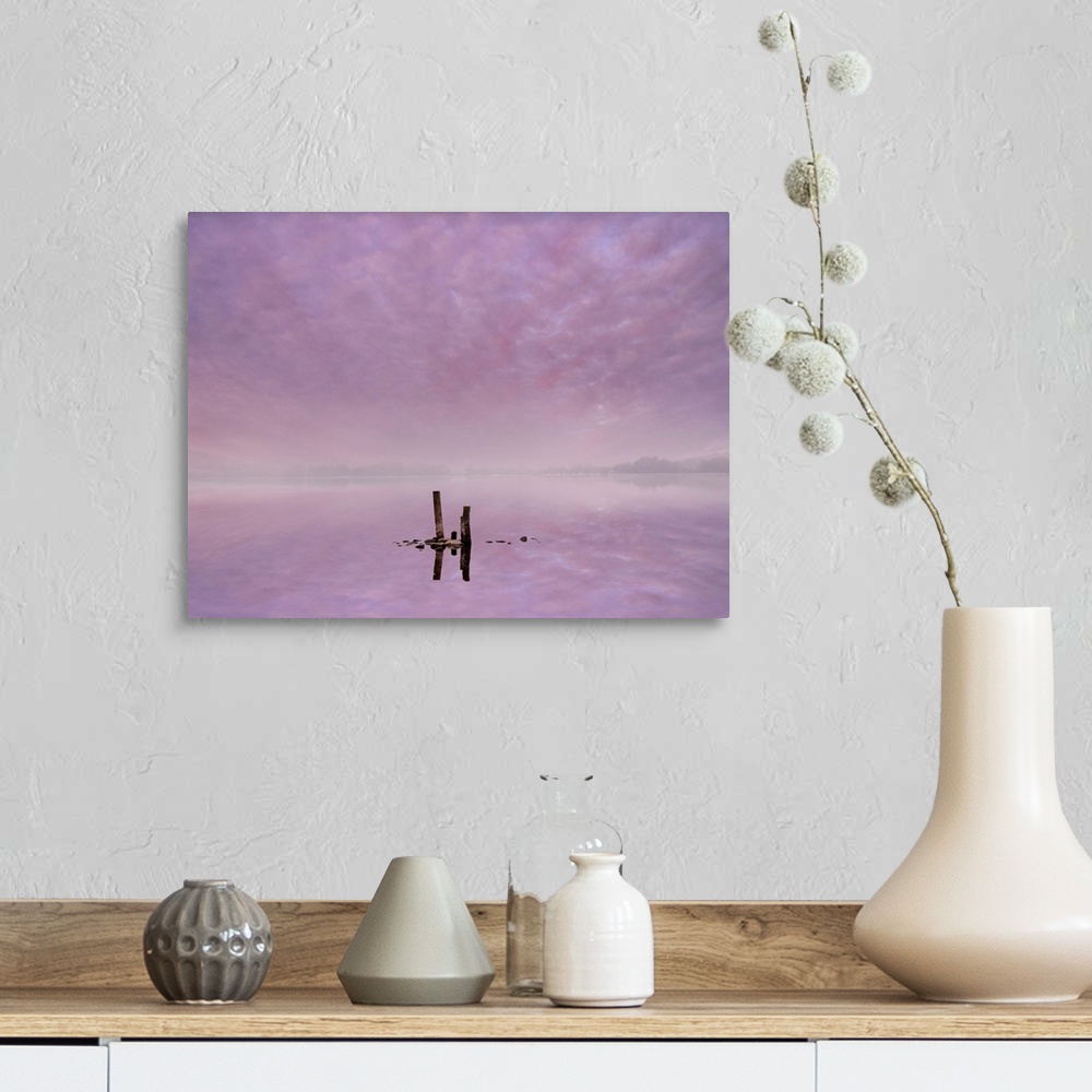A farmhouse room featuring Fine art photo of silhouetted posts in the lavender water of Lake Ullswater, Cumbria in the morning.