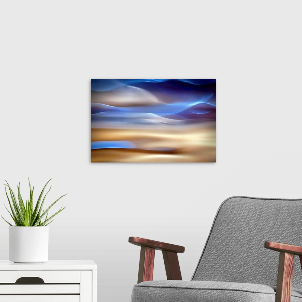 A modern room featuring An abstract piece of artwork that has waves of blue and tan running horizontally.