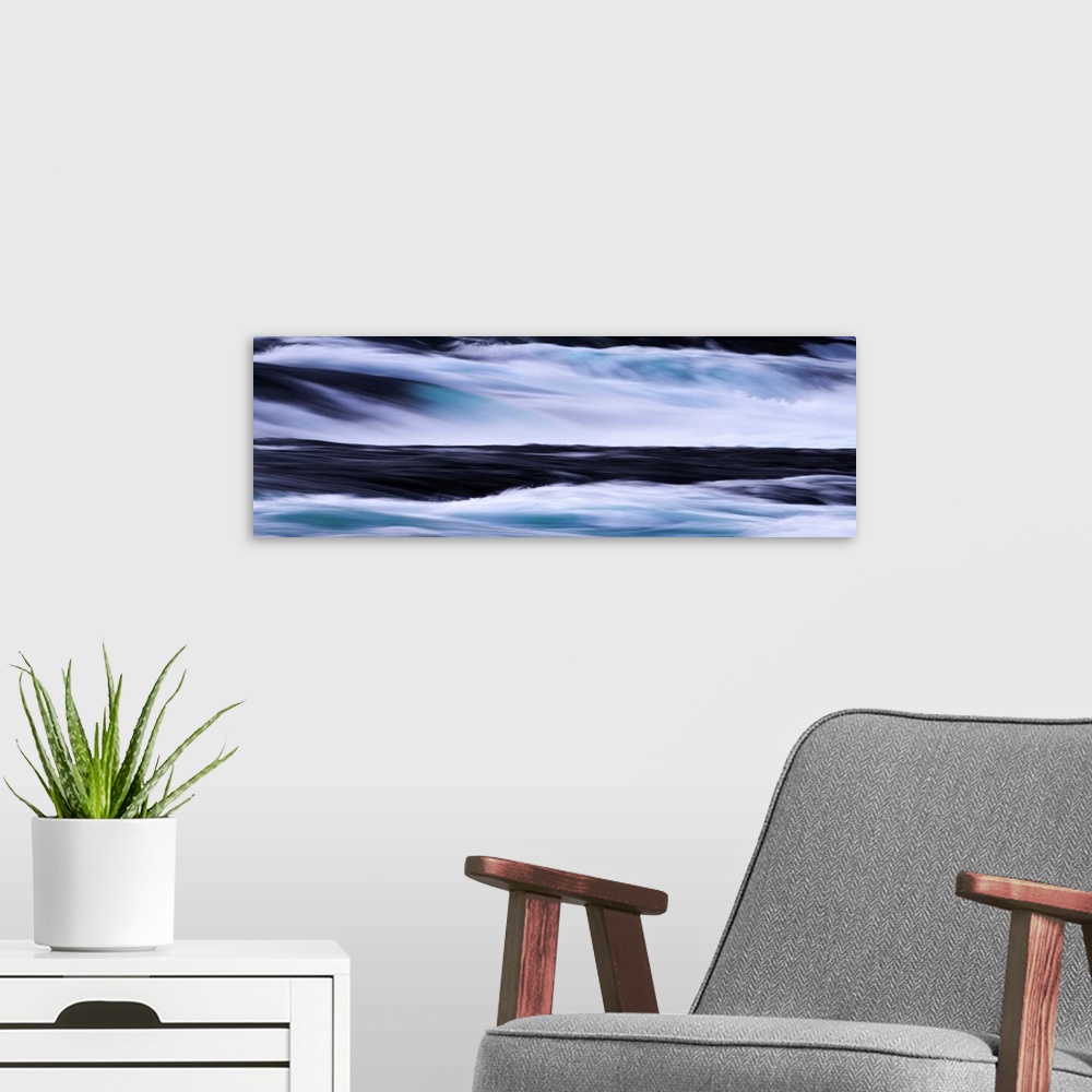 A modern room featuring Close up of wave motion with waterfall