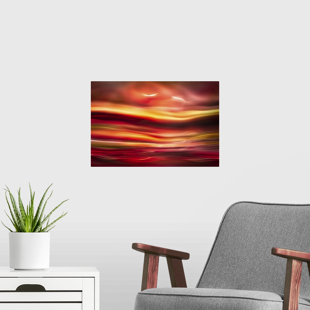 A modern room featuring An abstract photograph of vibrant colors in a wave-like formation.