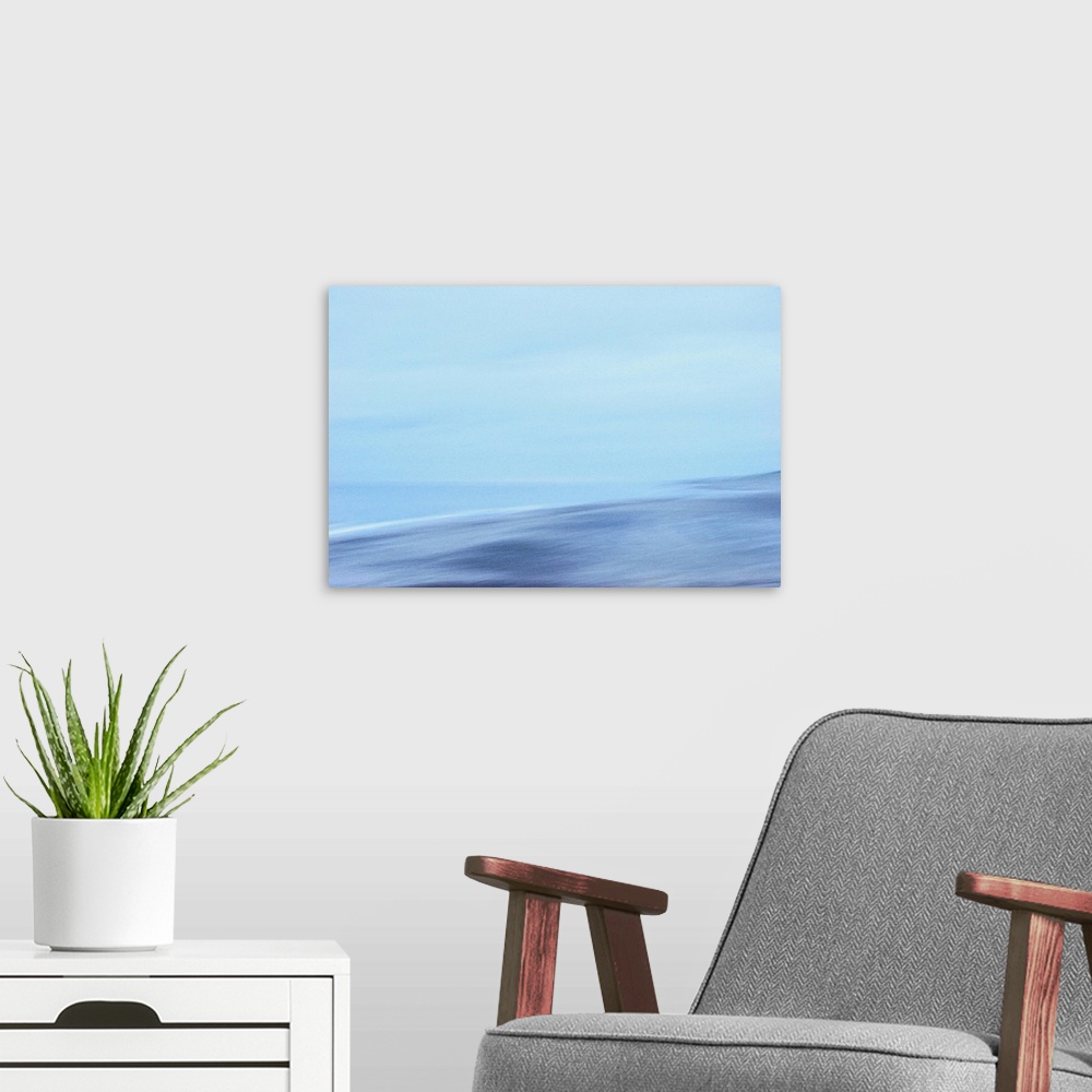 A modern room featuring Artistically blurred photo. The North Sea coast of North Jutland, Denmark, on a quiet hazy winter...