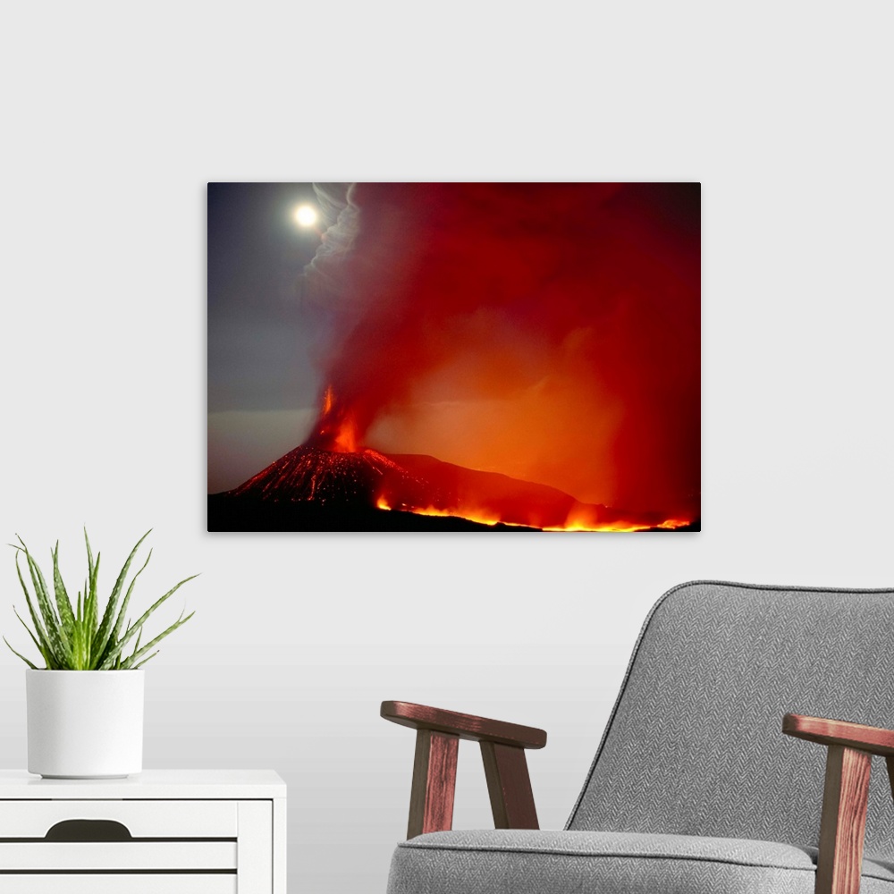 A modern room featuring Fine art photo of a volcano erupting and spewing ash into the night sky.
