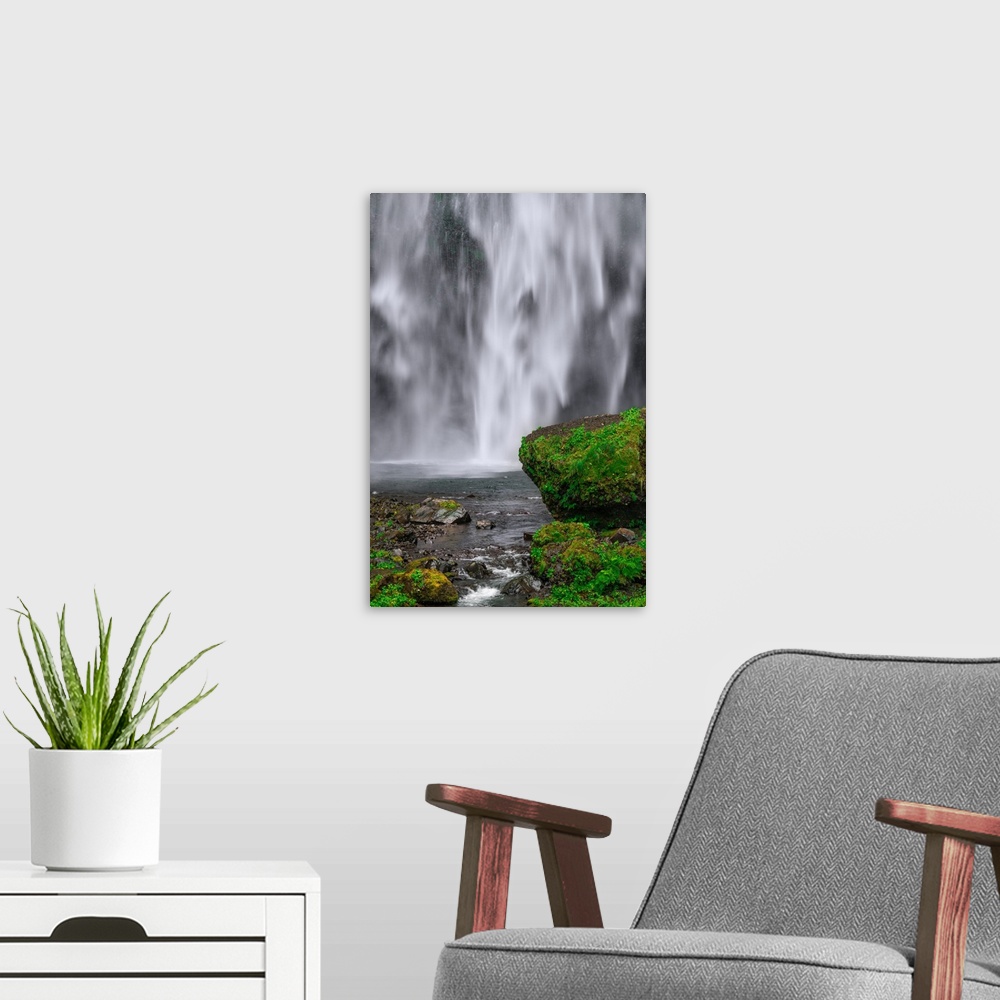 A modern room featuring Mossy rocks at the base of Multnomah Falls in Oregon.