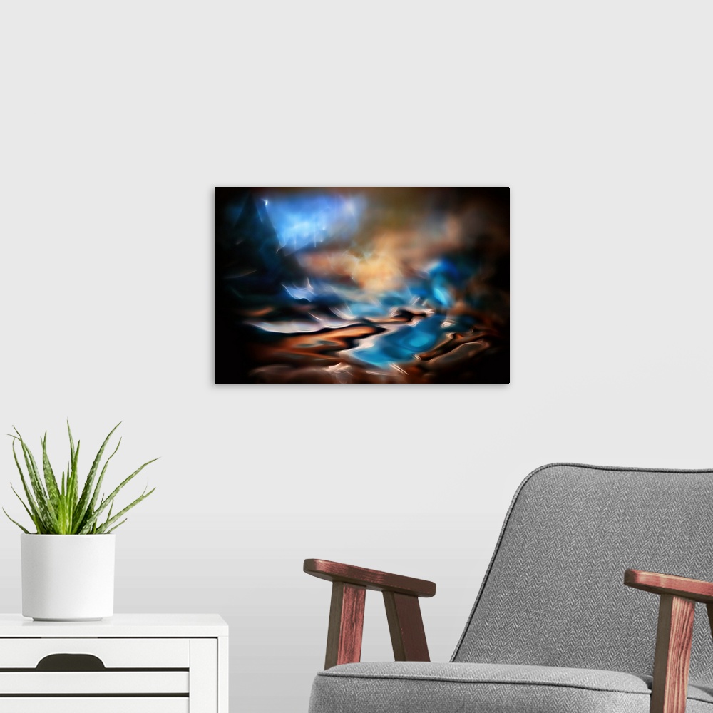 A modern room featuring Abstract photograph in dark hues with bright blues.