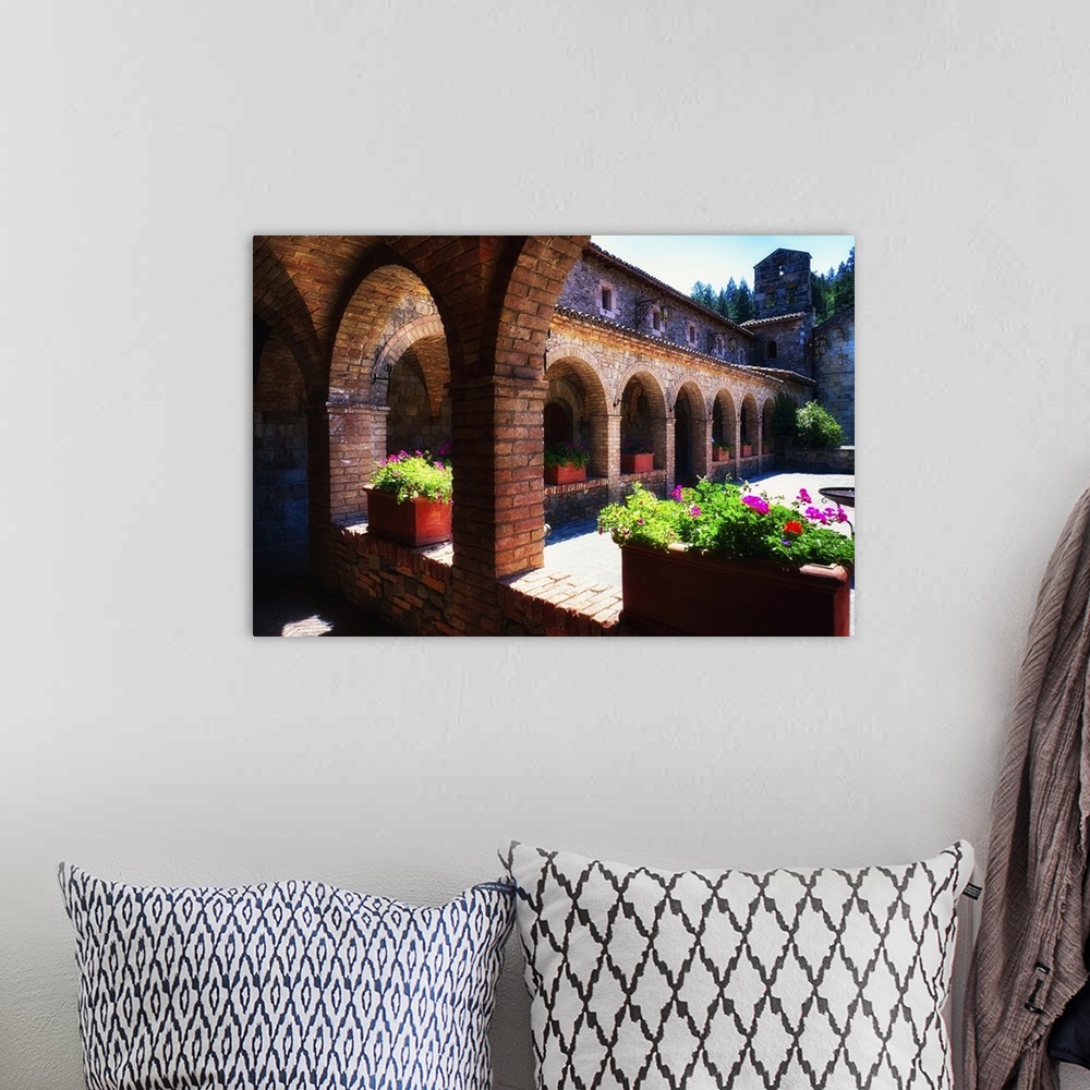A bohemian room featuring Colonnade and Courtyard of a Tuscan Style Castle, Castello de Amorosa