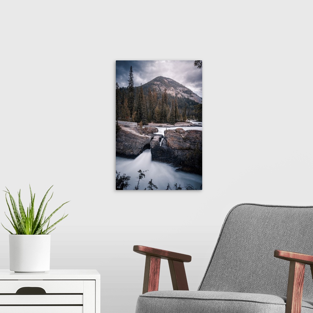 A modern room featuring Silky water from long exposure at Natural Bridge of Yoho National Park on the western slopes of t...