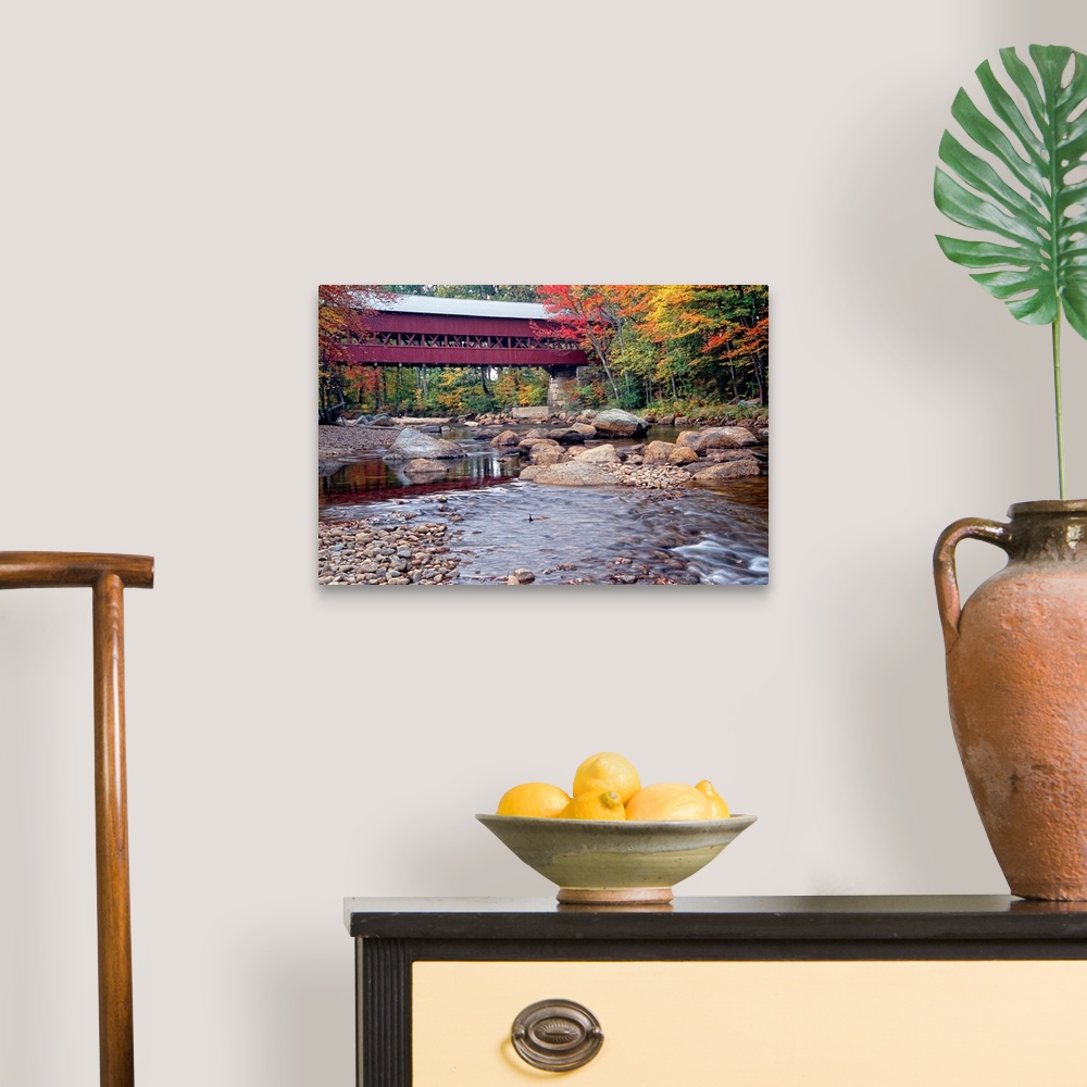 A traditional room featuring Photograph of the wooden Swift River Bridge located in Conway, New Hampshire that overlooks a riv...