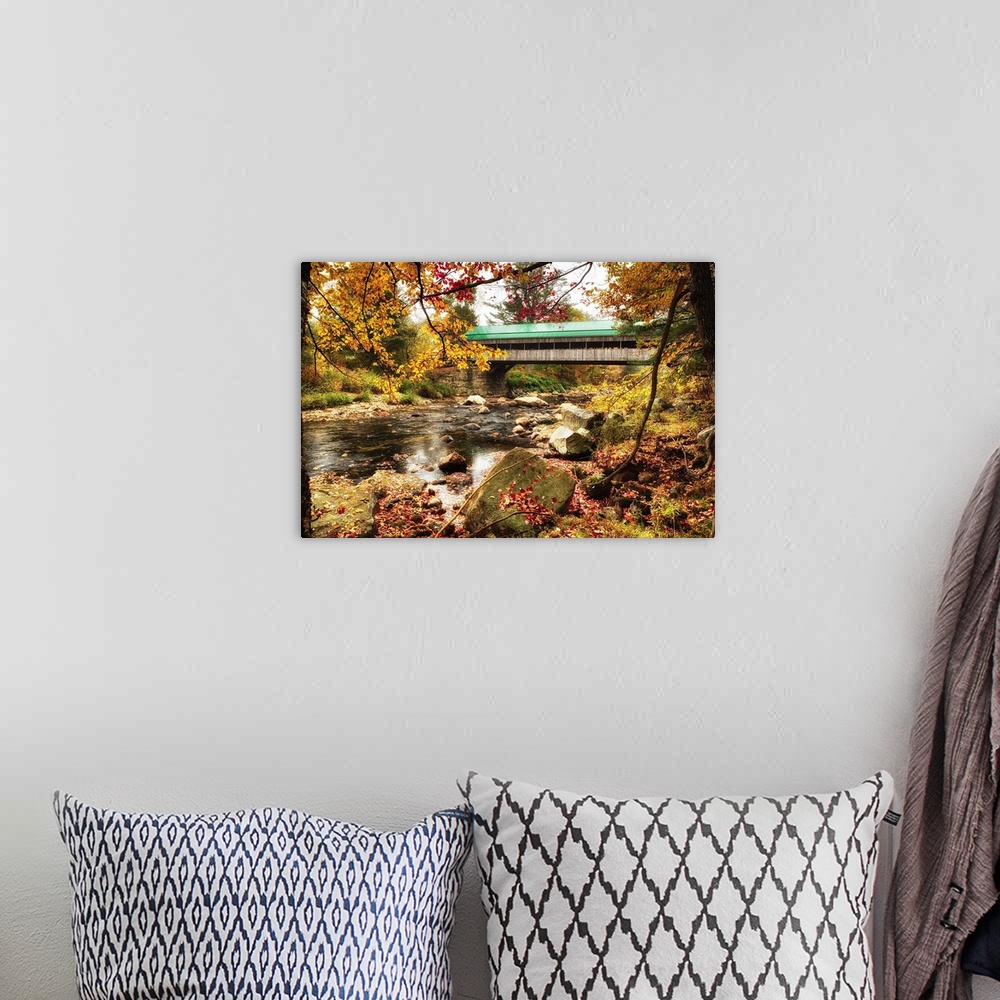 A bohemian room featuring Fine art photo of a covered bridge in New England over Ellis River in autumn.