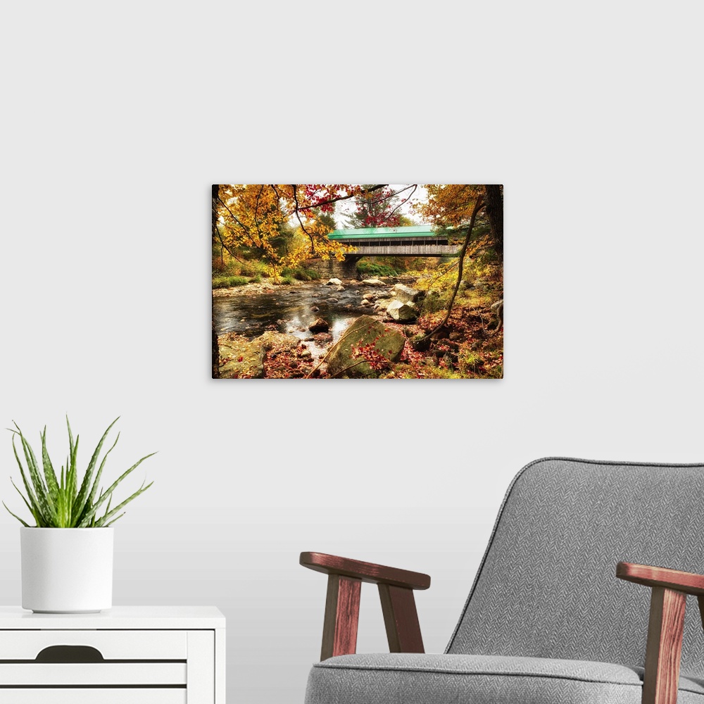 A modern room featuring Fine art photo of a covered bridge in New England over Ellis River in autumn.