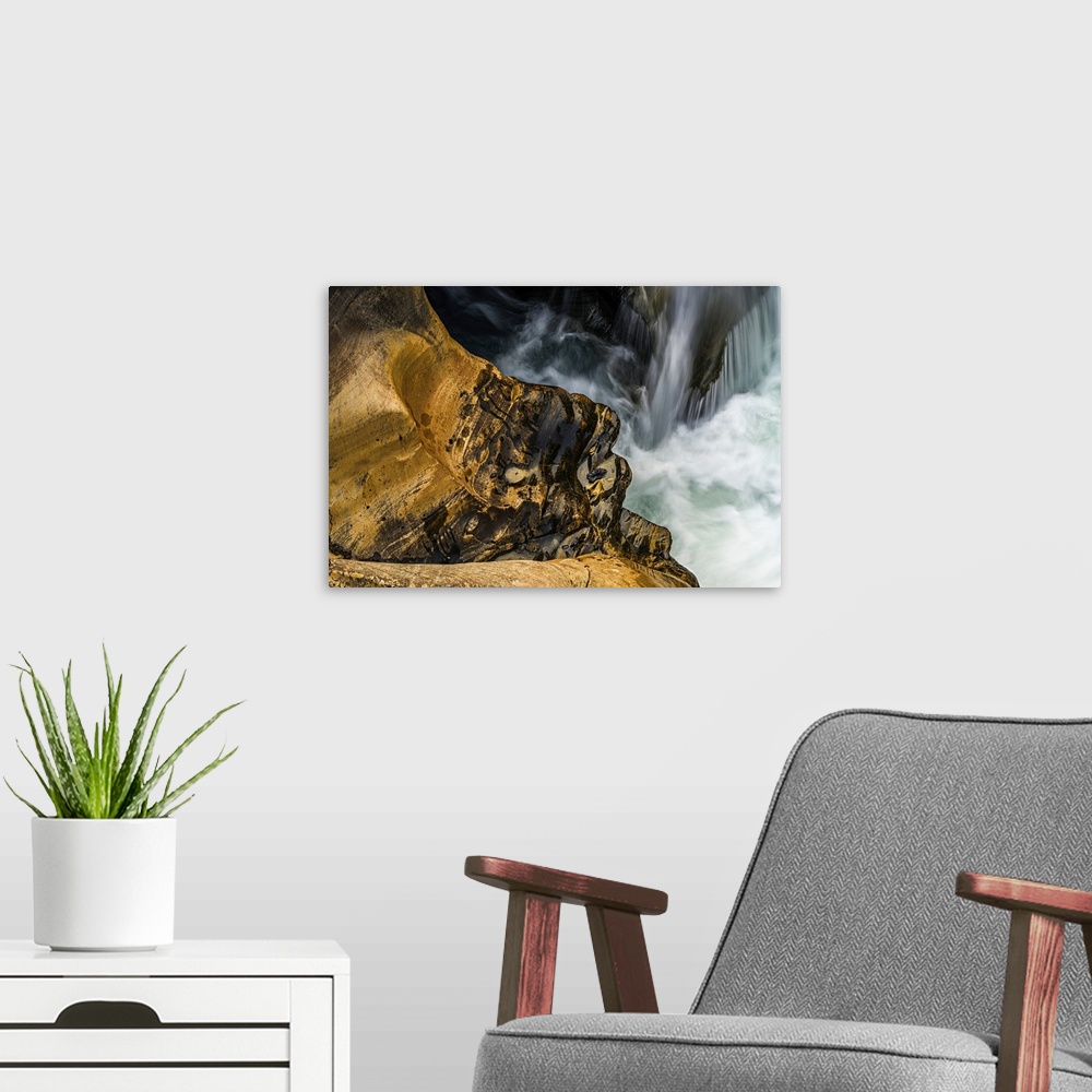 A modern room featuring Closeup of water and rocks by Numa Falls, in Kootenay National Park, Canada.