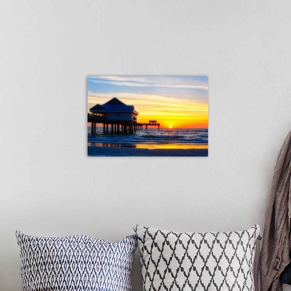 A bohemian room featuring Clearwater beach Sunset over the Pier, Florida.