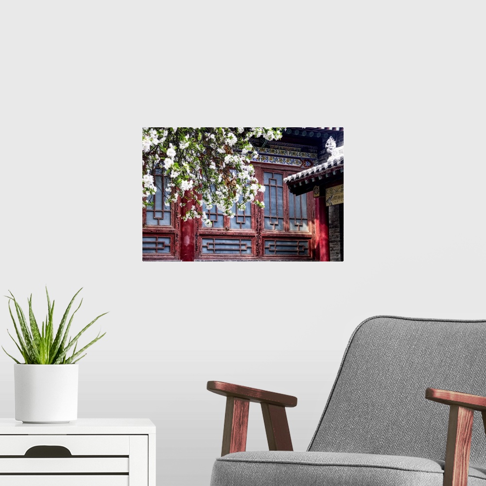 A modern room featuring Blooming tree in front of a historic building, Beilin, Forest of the Stone Steles, Beilin, Shian,...