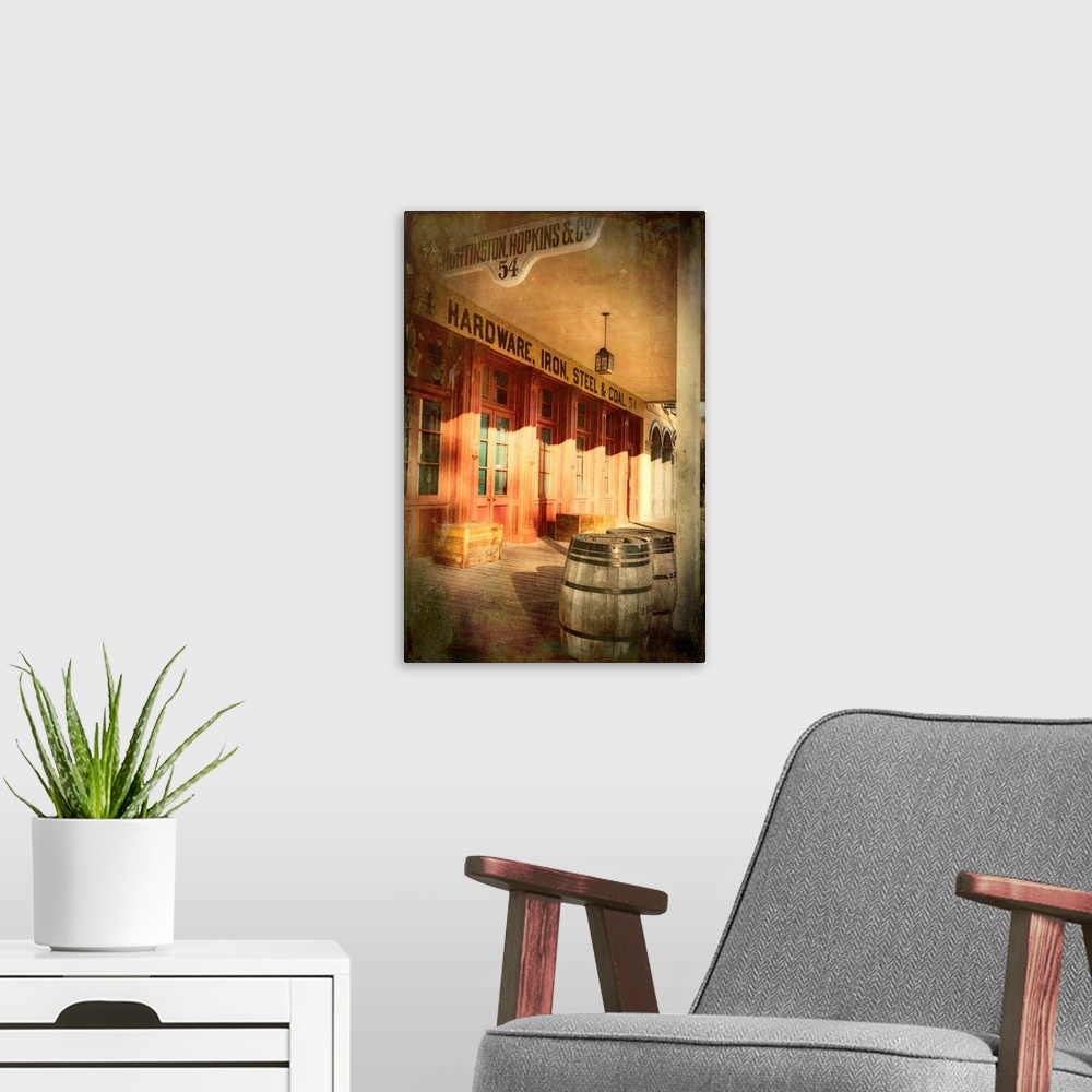 A modern room featuring A photo of a storefront from a frontier town that has been edited to an antique effect.