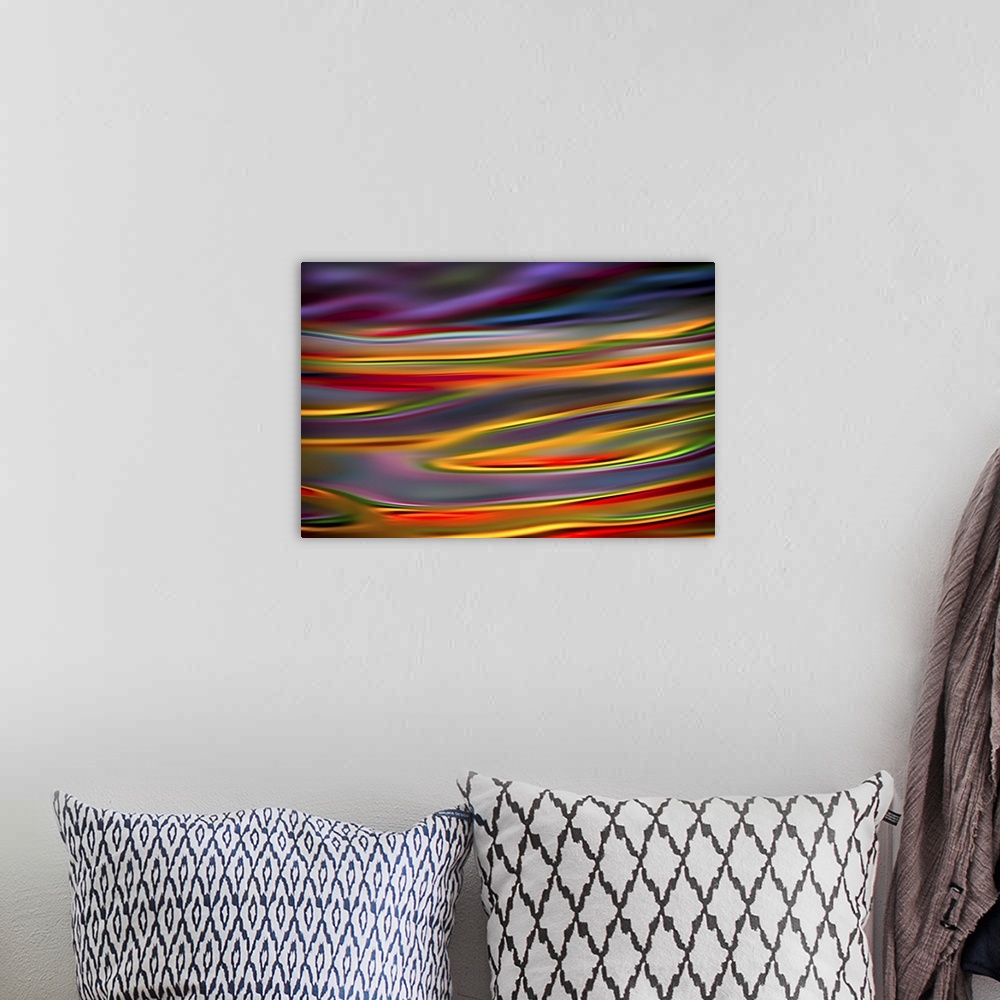 A bohemian room featuring Abstract photograph with dreamy lines in hues of the rainbow.