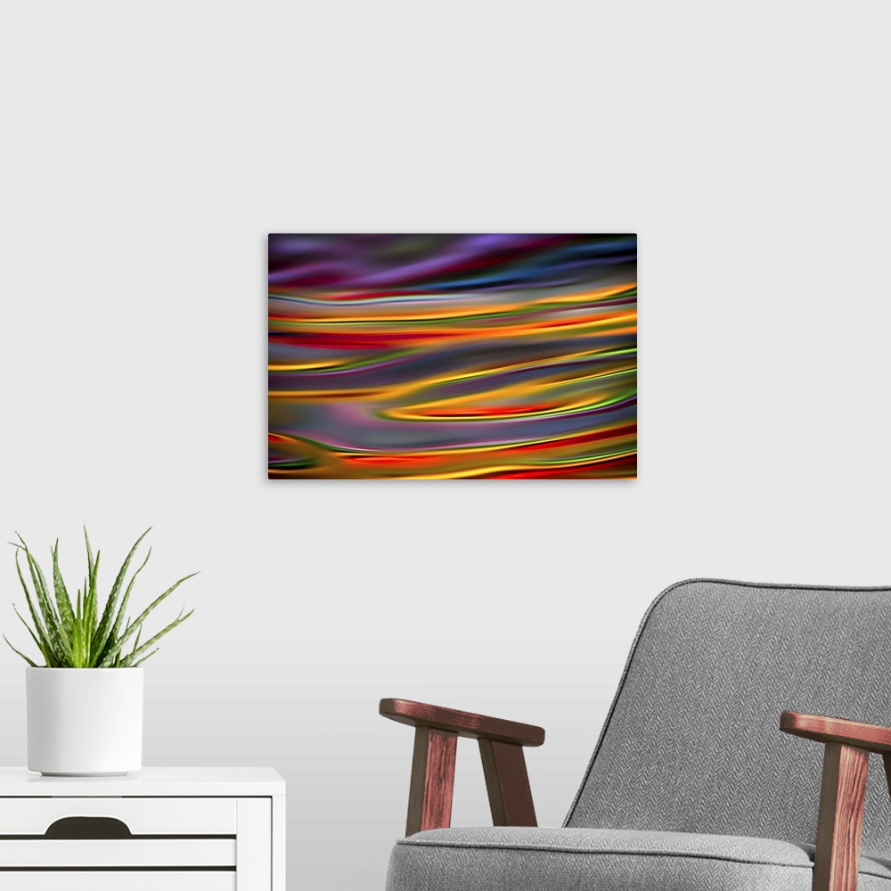 A modern room featuring Abstract photograph with dreamy lines in hues of the rainbow.