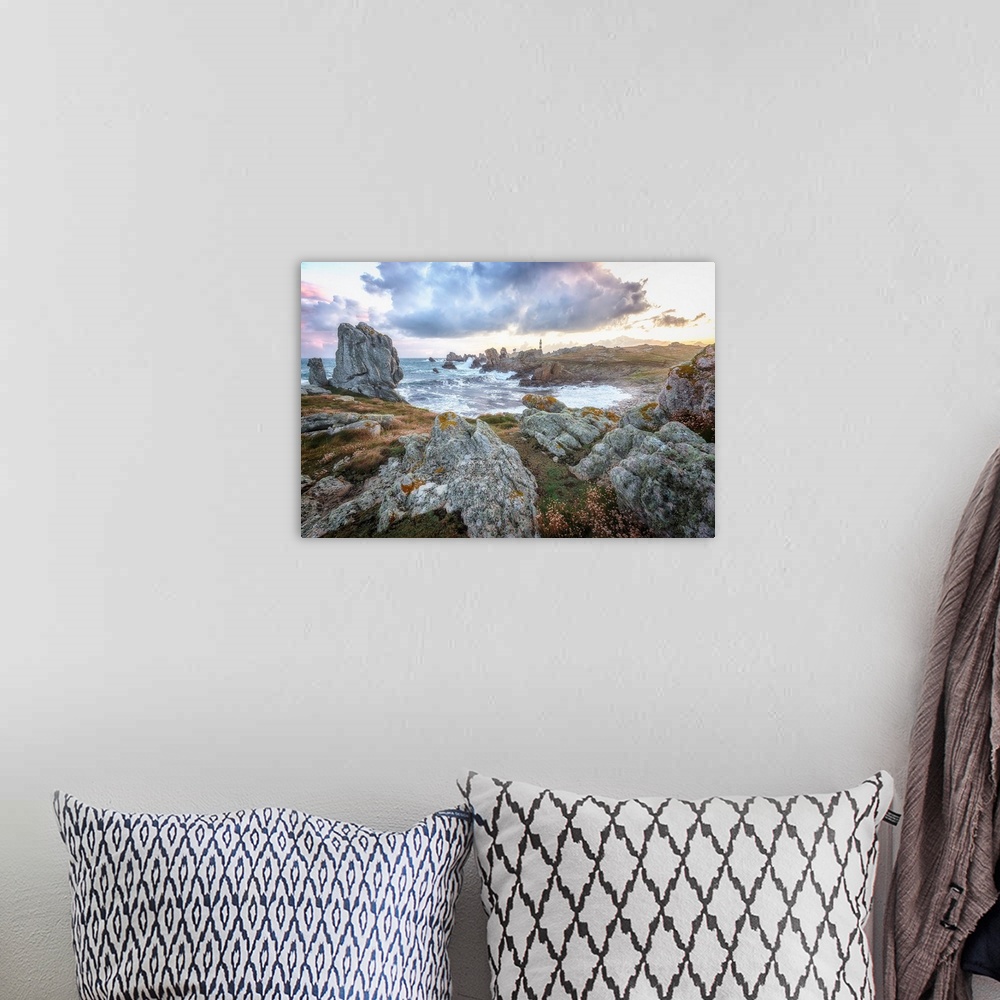 A bohemian room featuring Fine art photo of a lighthouse on a rocky shore in the north of France.