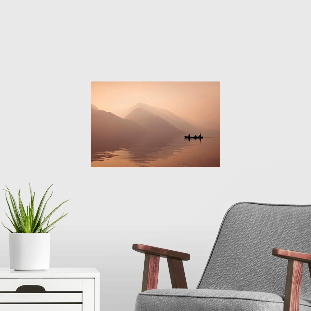 A modern room featuring A photograph of people in a rowboat on lake beside mountains in silhouette.