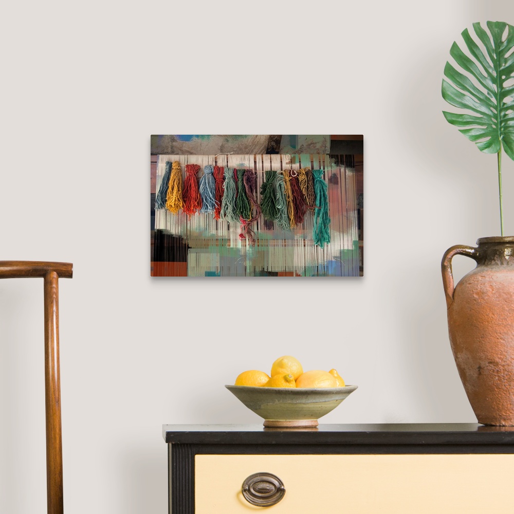 A traditional room featuring Photograph of colorful bundles of yarn hanging on a line with an abstract background.