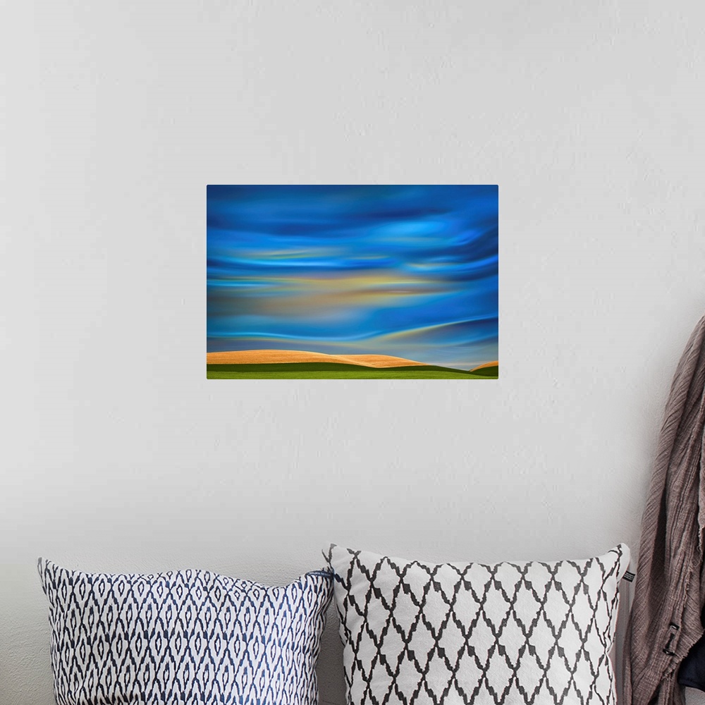 A bohemian room featuring Abstract photograph of the Palouse farmland in Washington state, with a vibrant blue motion blurr...