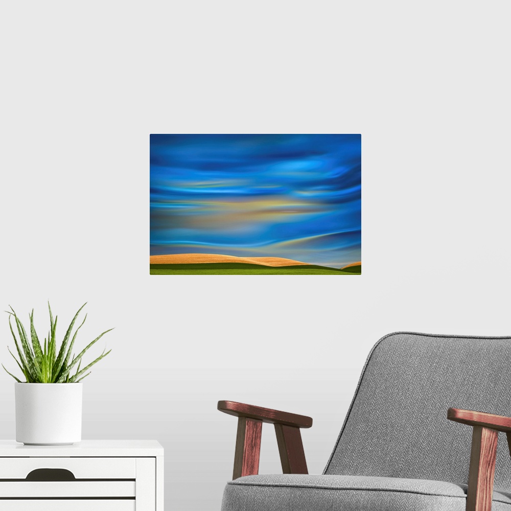 A modern room featuring Abstract photograph of the Palouse farmland in Washington state, with a vibrant blue motion blurr...