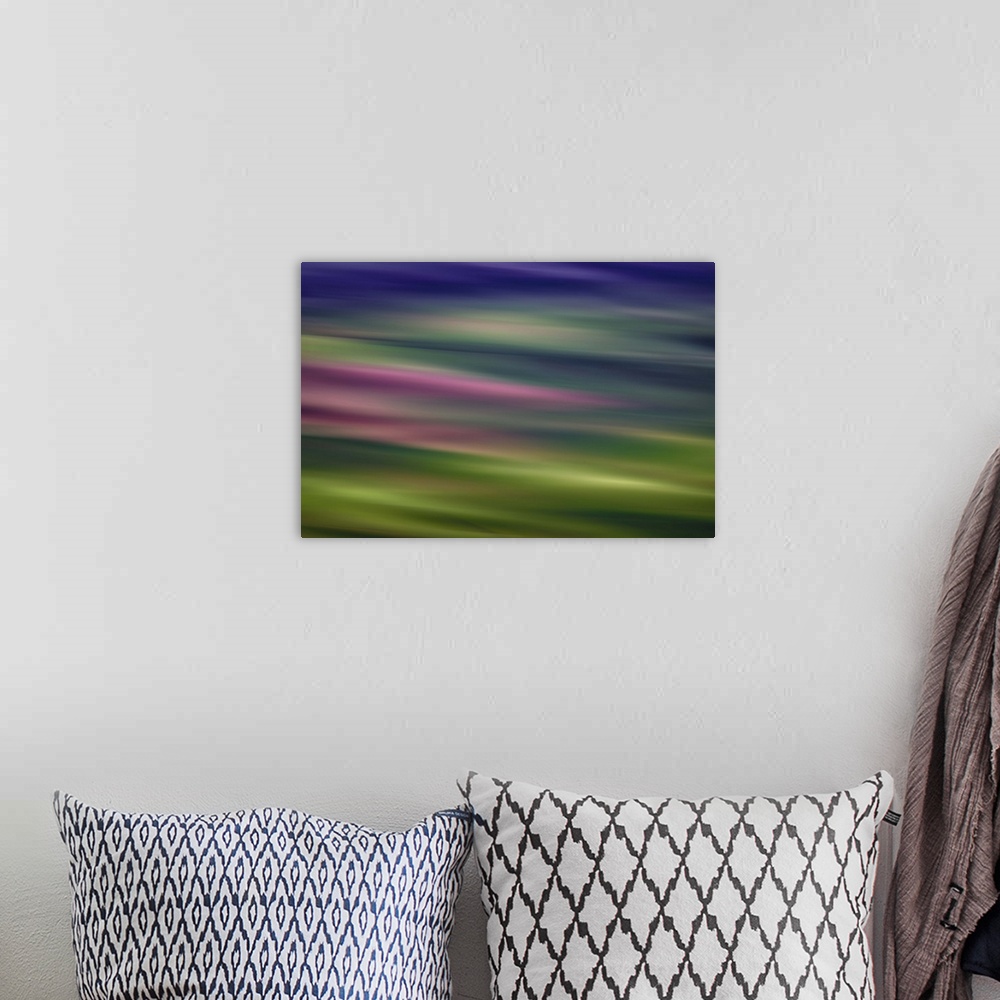 A bohemian room featuring Long exposure image of the Palouse hills a purple haze.