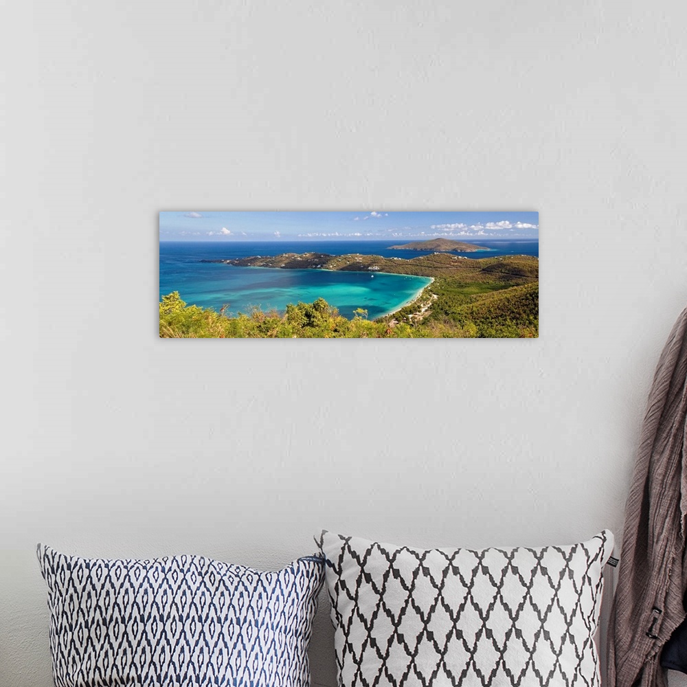 A bohemian room featuring This panoramic photograph is an aerial shot of a bay in the virgin islands surrounded by large hi...