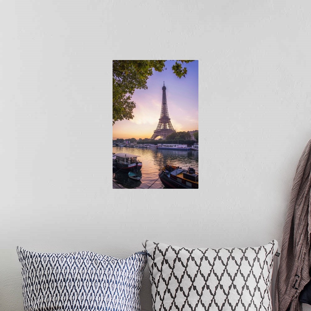 A bohemian room featuring Sunrise on the Eiffel tower on summer morning in Paris with Peniche boats waiting on the side of ...