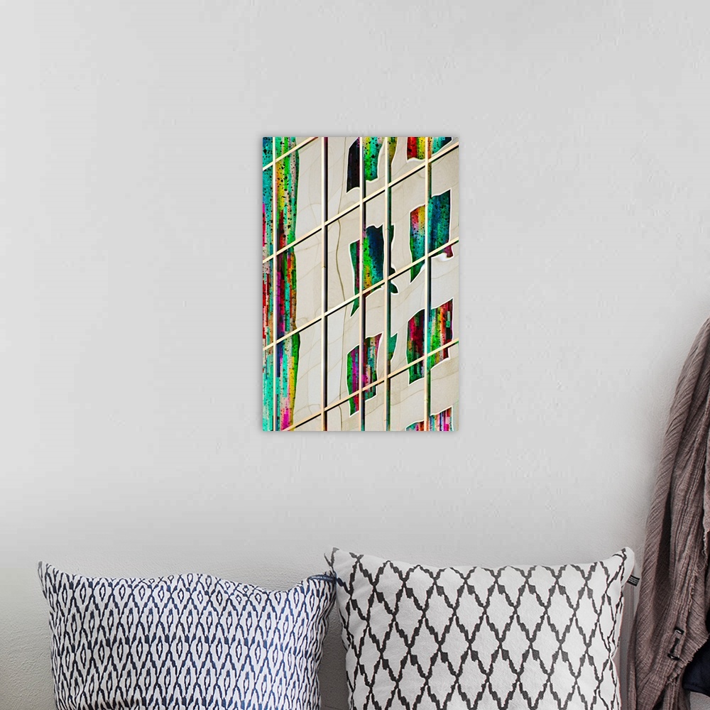 A bohemian room featuring Abstract photograph of a warped image of colorful windows, reflected in the side of a skyscraper.