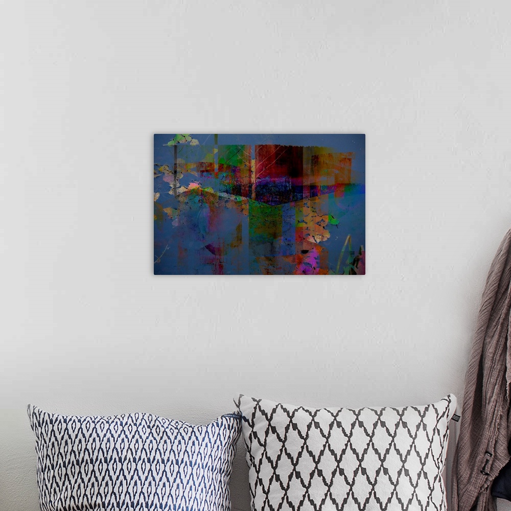 A bohemian room featuring Abstract artwork of distressed textures in psychedelic colors.