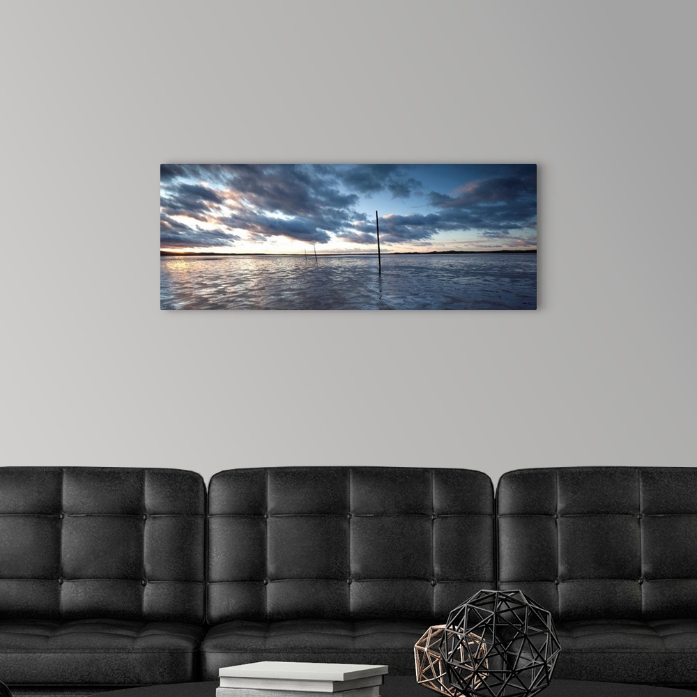 A modern room featuring A Panoramic Sunrise over the Pilgrims Causeway at Lindisfarne on Holy Island, Northumberland, UK ...