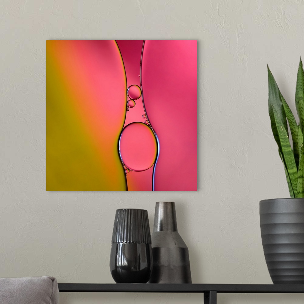 A modern room featuring A macro photograph of air bubbles illuminated by vibrant colors.