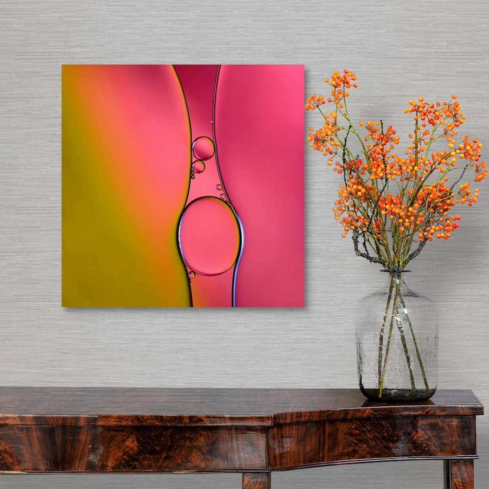A traditional room featuring A macro photograph of air bubbles illuminated by vibrant colors.