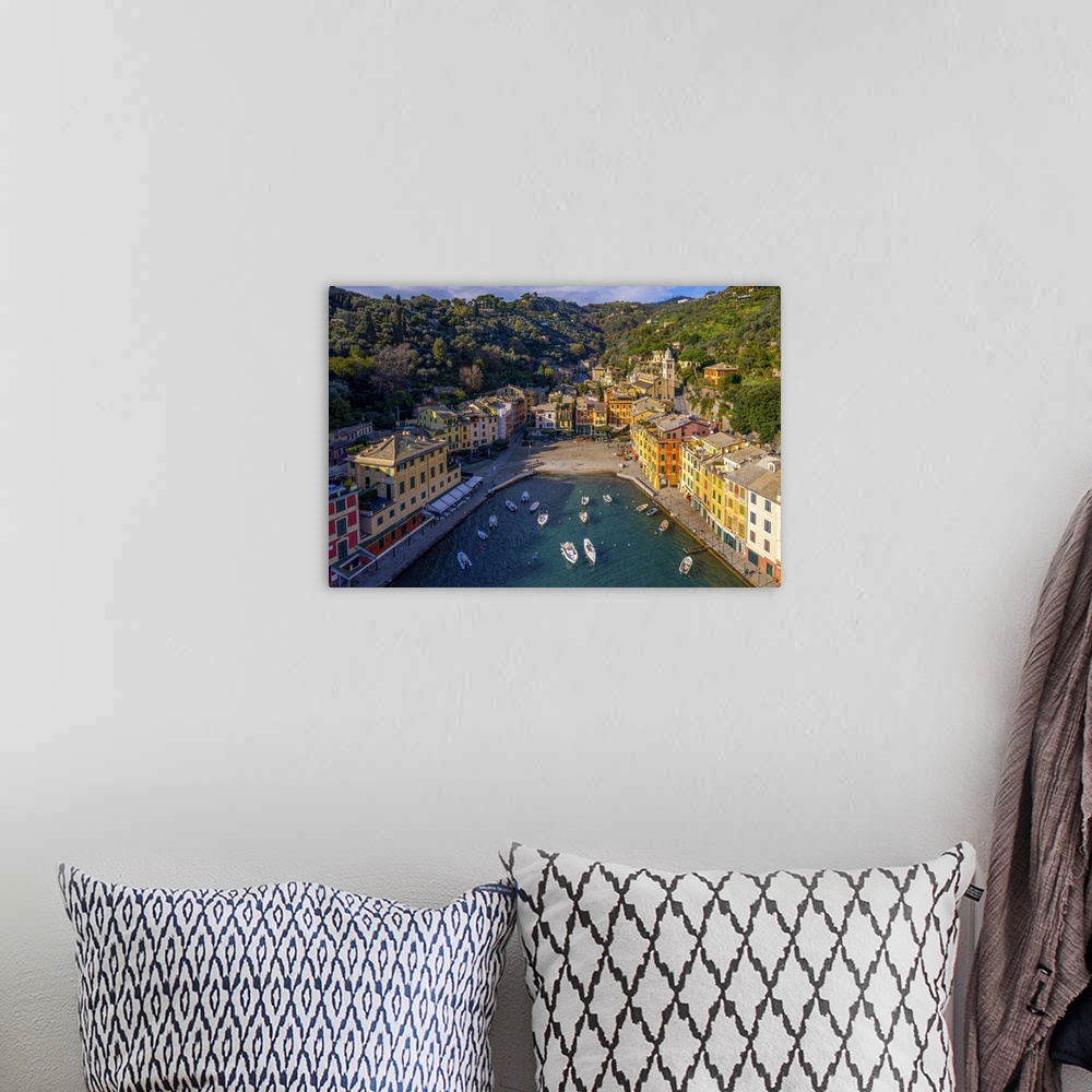 A bohemian room featuring Portofino is a fishing village on the Ligurian Riviera near the city of Genoa. Pastel-colored hou...