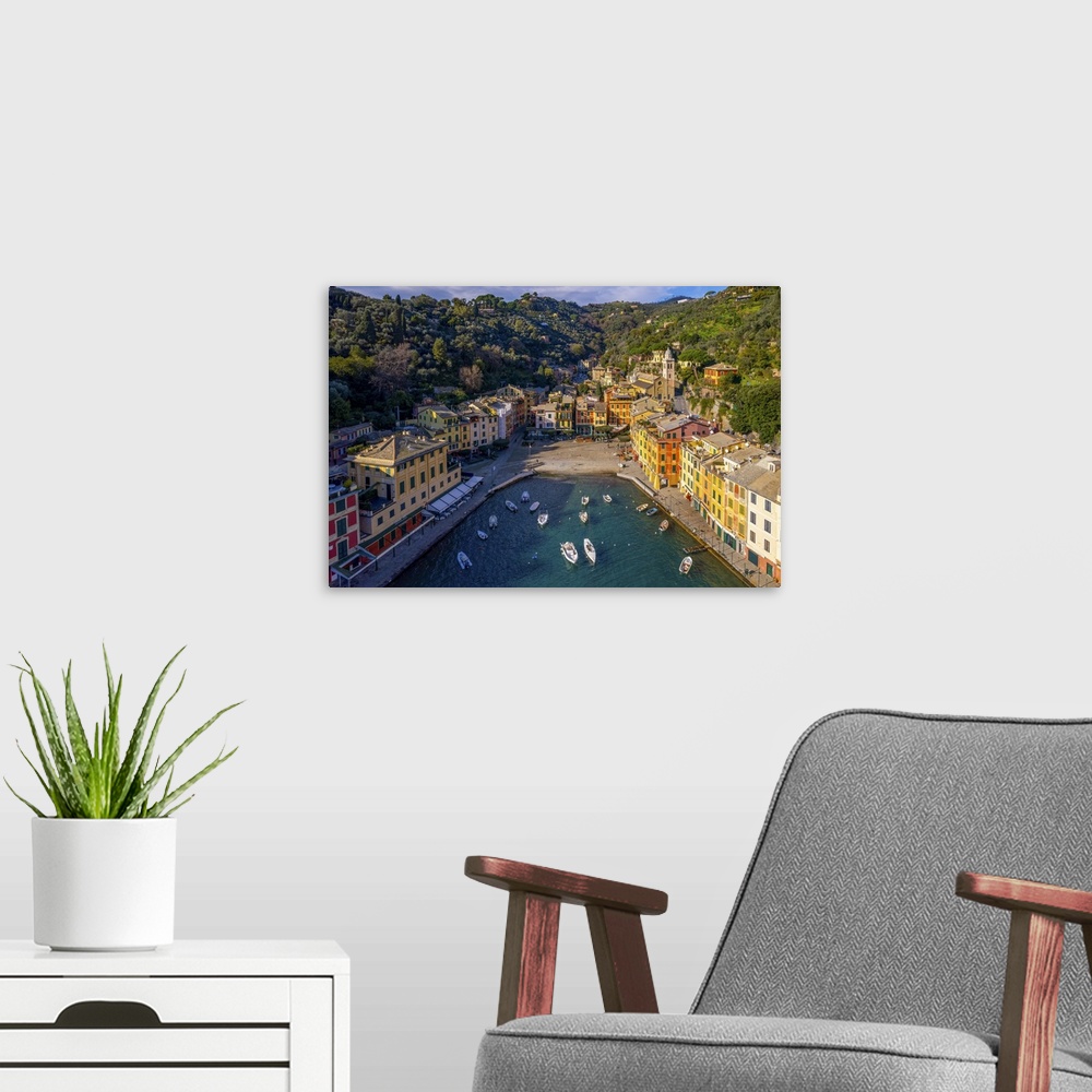 A modern room featuring Portofino is a fishing village on the Ligurian Riviera near the city of Genoa. Pastel-colored hou...