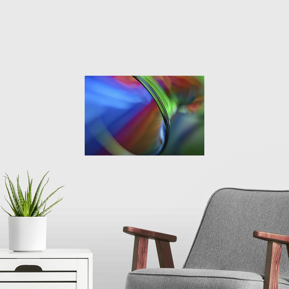A modern room featuring An abstract macro photograph of a vase on its side.