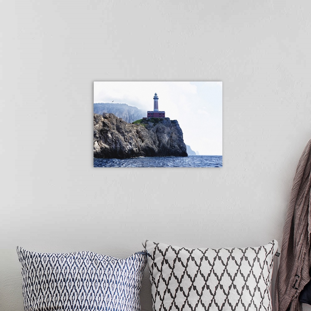A bohemian room featuring Low Angle View of the Punta Carena Lighthouse, Anacapri, Campania, Italy.