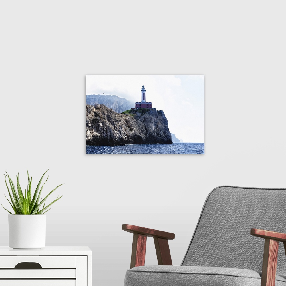 A modern room featuring Low Angle View of the Punta Carena Lighthouse, Anacapri, Campania, Italy.