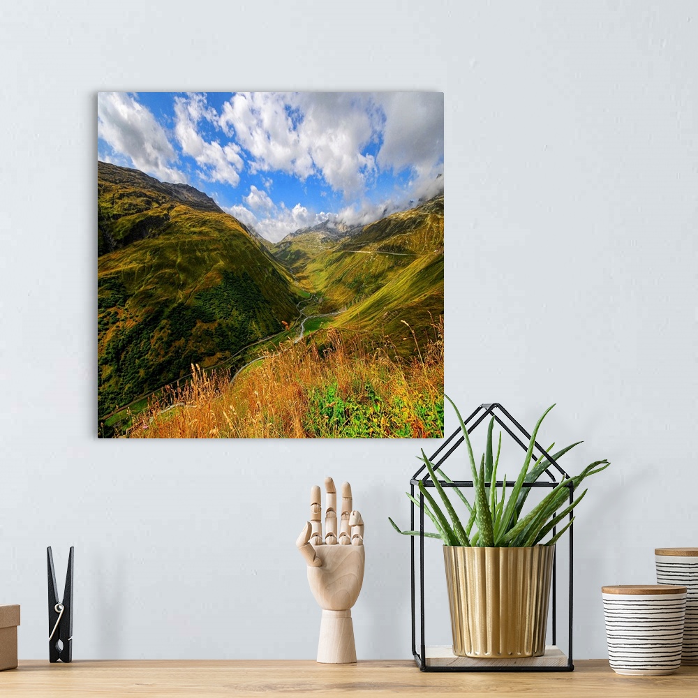 A bohemian room featuring Mountain landscape with clouds