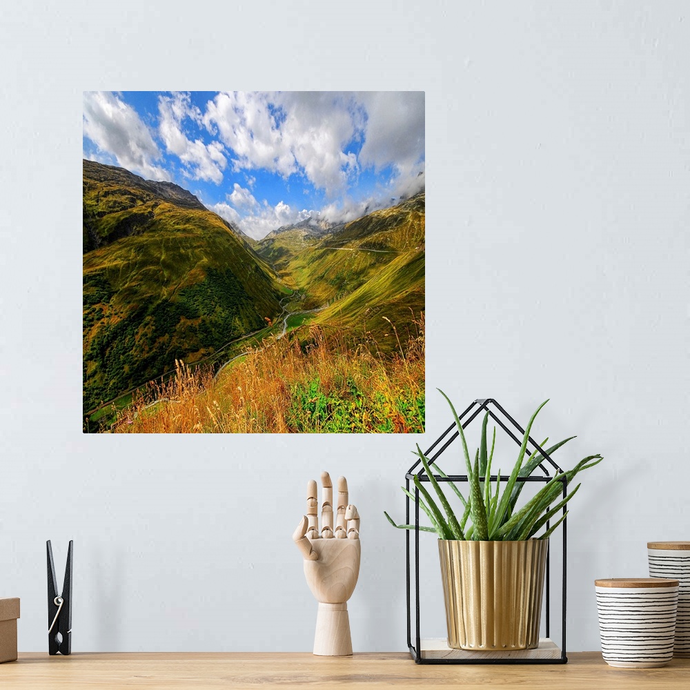 A bohemian room featuring Mountain landscape with clouds